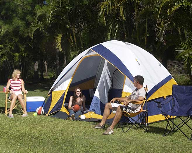 Family camping on an unpowered campsite at Brisbane Holiday Village