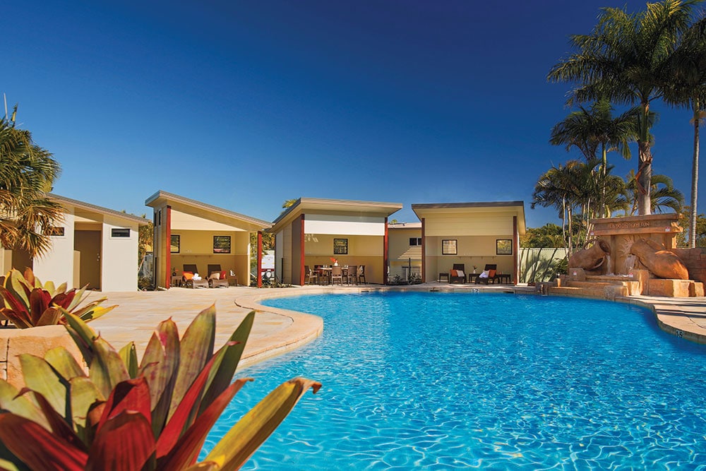 Poolside Cabanas across the lagoon pool at Brisbane Holiday Village