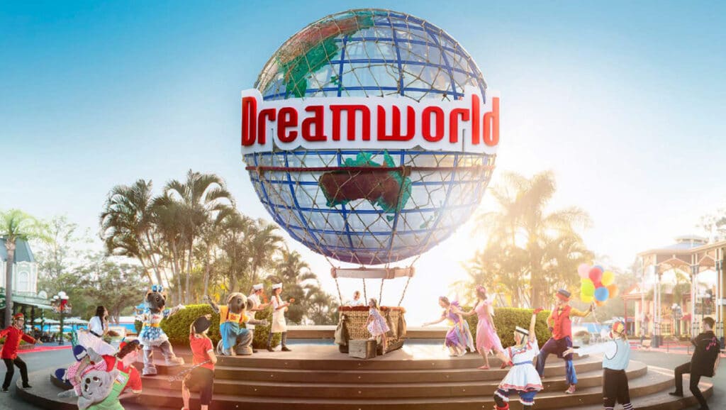 Dreamworld globe with characters posing around