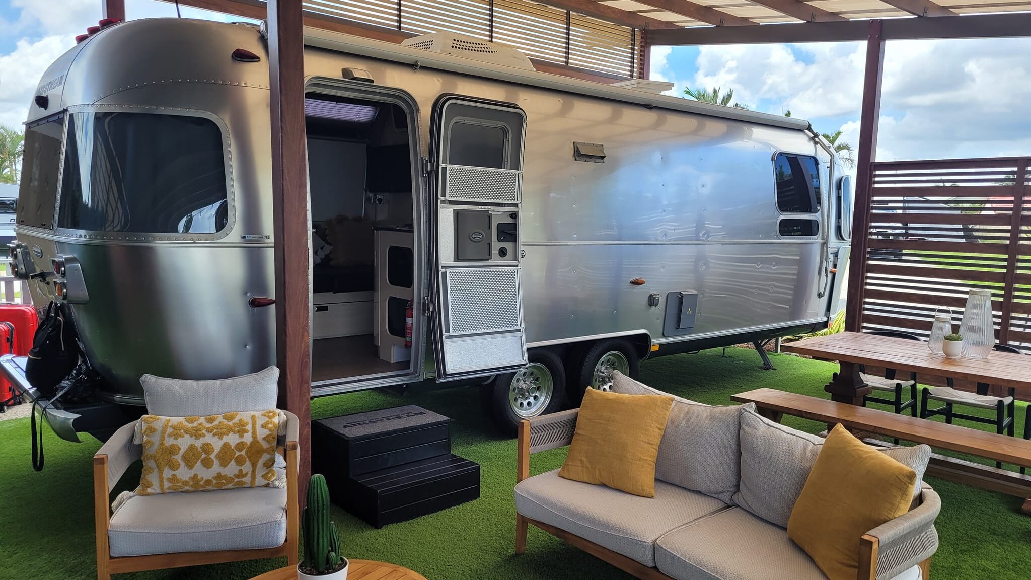 fully equipped outdoor entertainment area of the Airstream Glamping Caravans at Brisbane Holiday Village
