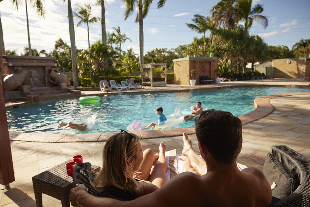 Brisbane Holiday Village's Lagoon of the Sun Swimming Pool and poolside cabanas