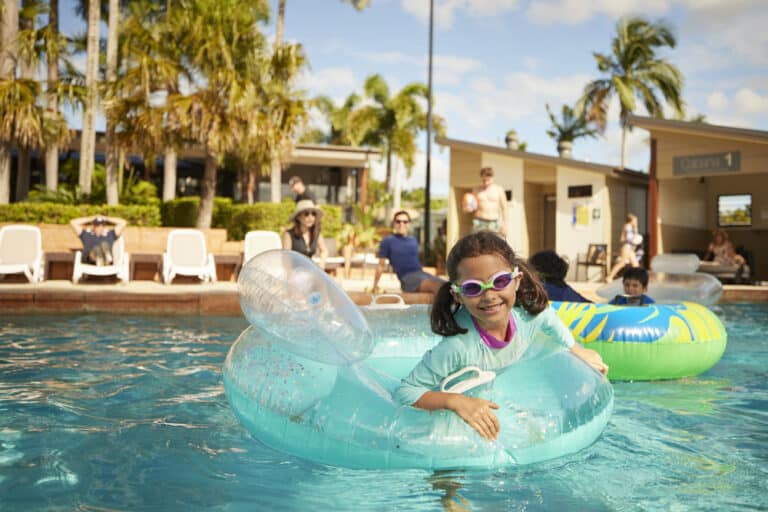 Brisbane Holiday Village's Lagoon of the Sun Swimming Pool and poolside cabanas