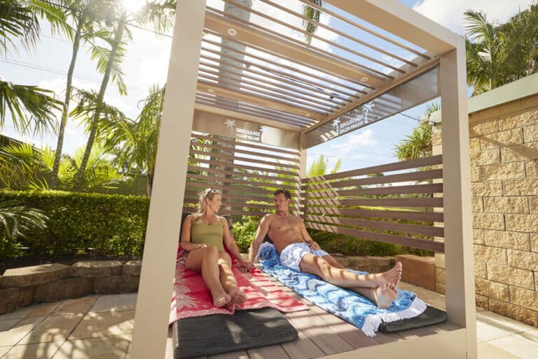 Sun Cabana's at Brisbane Holiday Village beside Lagoon of the Sun swimming pool